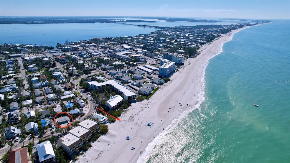 Located directly across the street from the beach with the beach access just 2 doors away. Red arrow shows the beach access.