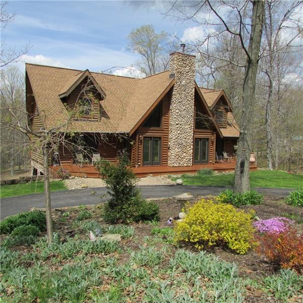True amish custom built log home,10 years old.