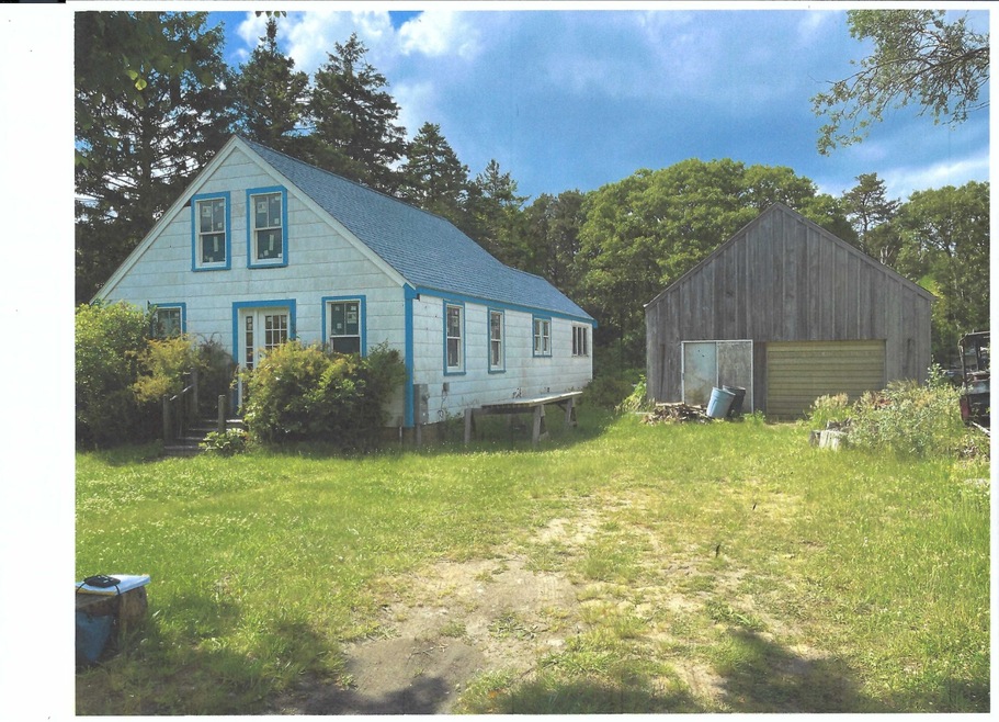 Home with oversized two-storey garage.