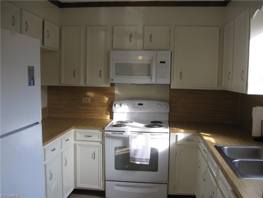 Complete Kitchen with range, refrigerator and disposal