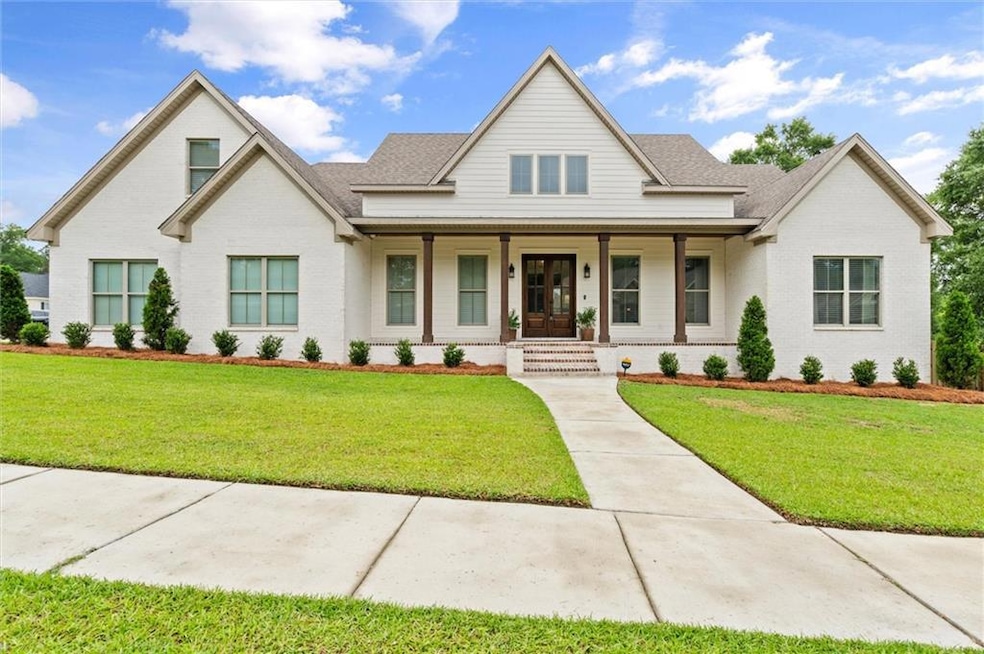 View of front of property featuring covered porch,