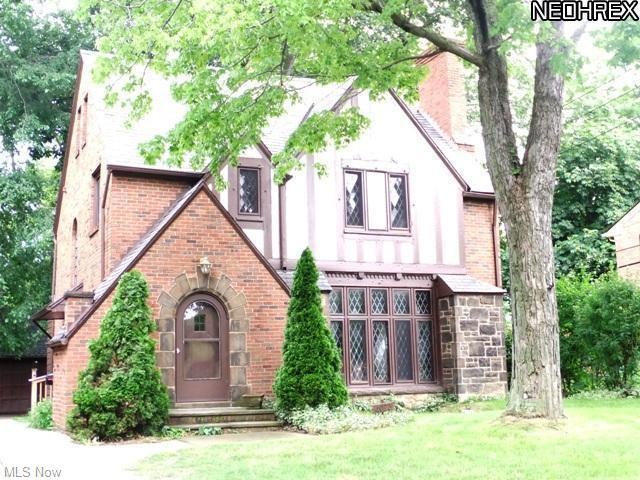Gorgeous Brick Tudor on tree-lined street