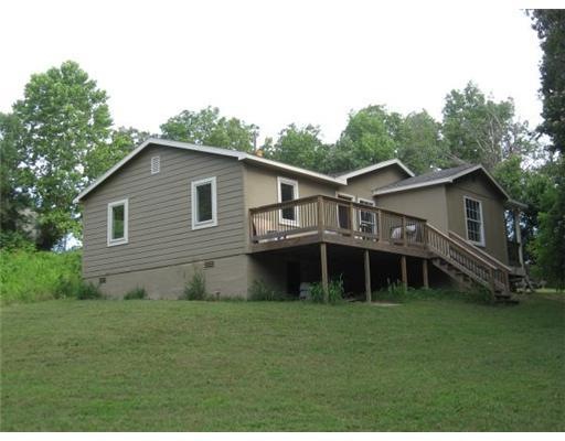 Exterior Back. Very private location yet close to