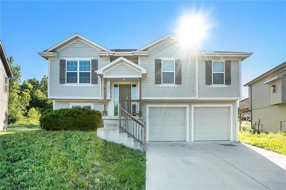 206 Elissa Dr, Raymore, MO 64083 - photo 1