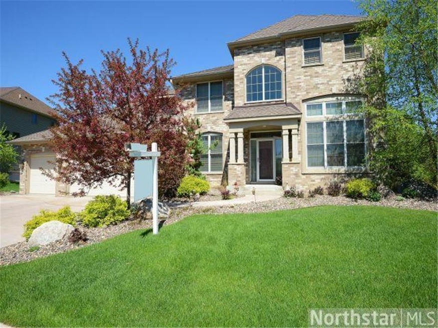 PRESTIGIOUS 2-STORY WALK-OUT IN GREAT MAPLE GROVE 