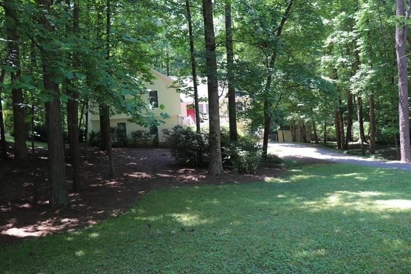 Welcome to Paradise! Lush .92 Acre Tucked Away on 