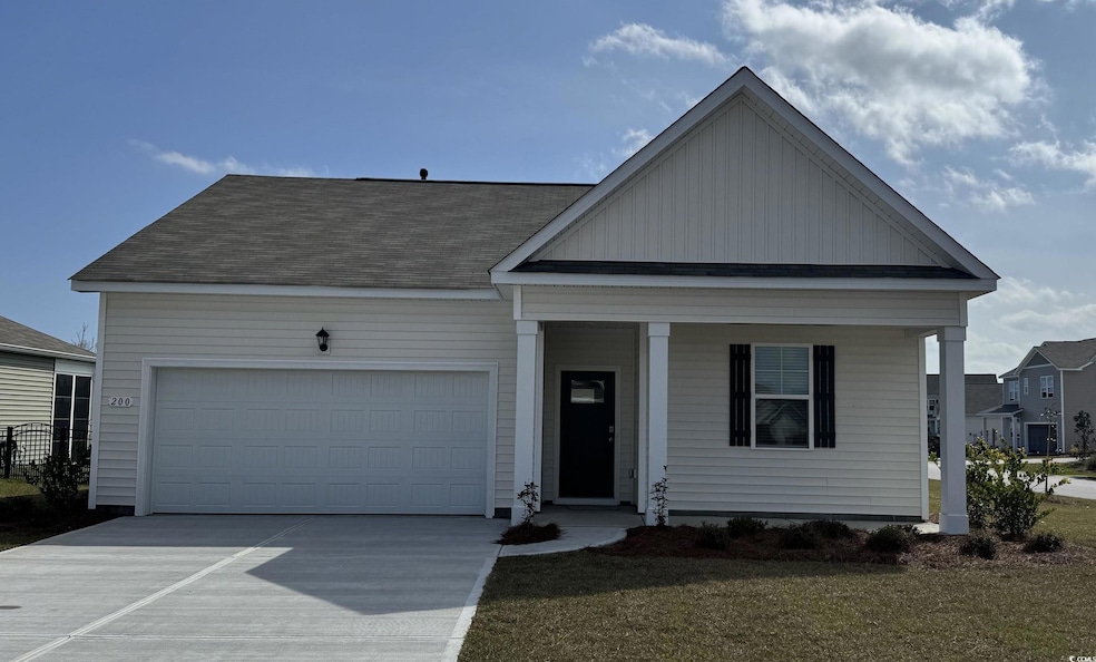 View of front of property with an attached garage,