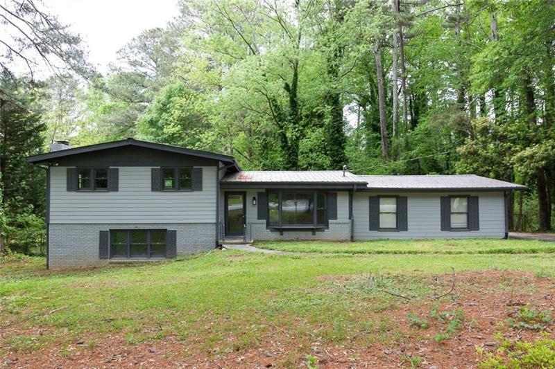 1507 Hewatt Rd SW, Lilburn, GA 30047 - photo 1