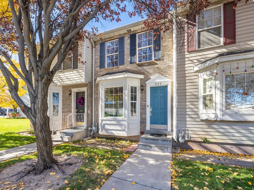 View of front of home featuring brick siding