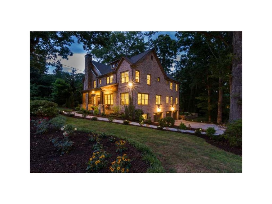 Exterior Front. Estate home, nestled on large corn