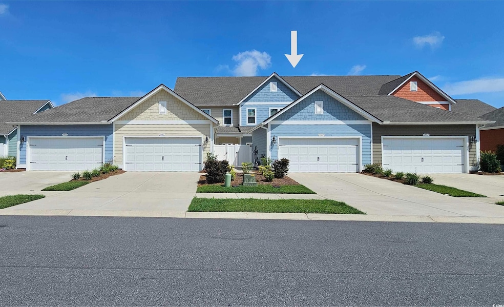 View of front of house featuring driveway