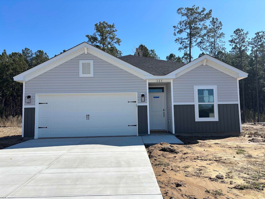 Ranch-style home featuring driveway, an attached g