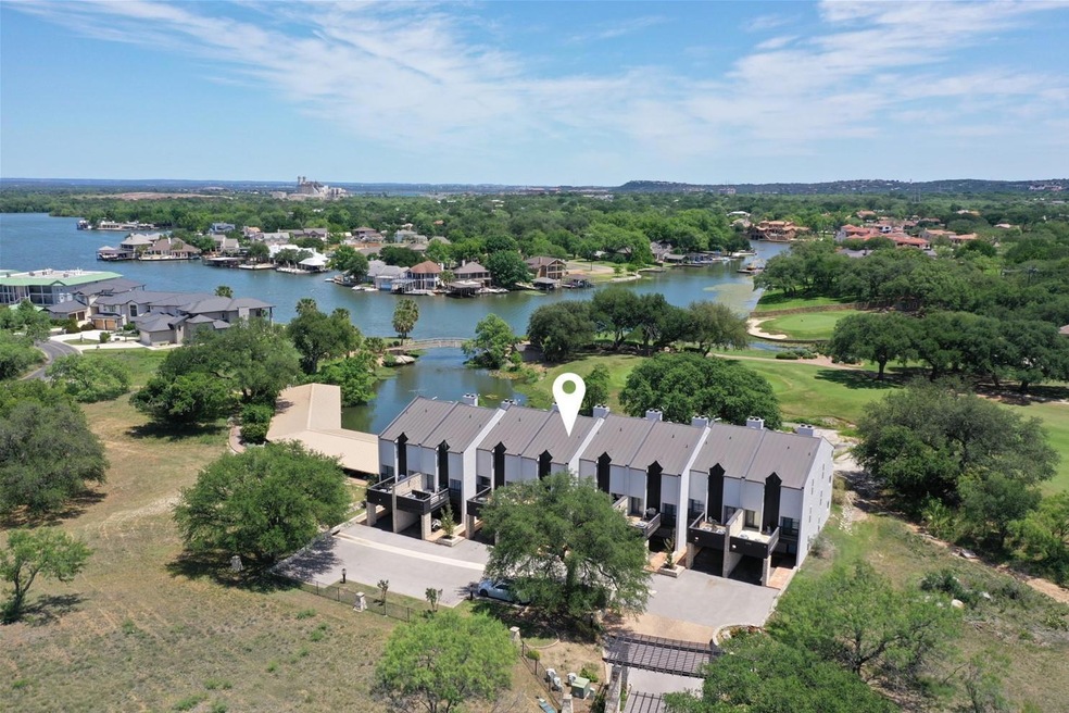 Aerial view of property and surrounding area with