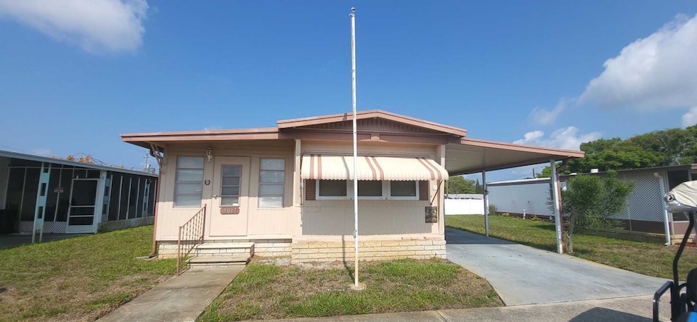 9017 Rawlins Ave, Port Richey, FL 34668 - photo 1