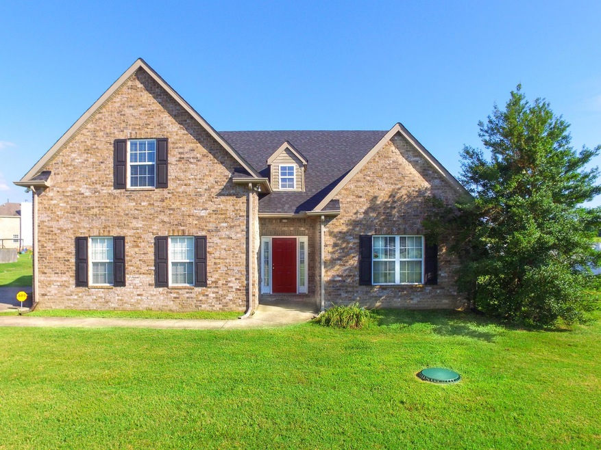 Welcome home!  2026 Sq ft Brick home with 4 Bedrooms and 3 full baths. 