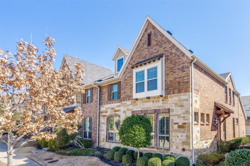 View of front of property with stone siding and br