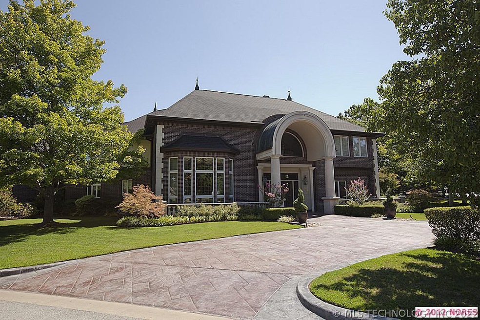 Impressive, stately brick home  with circle drive