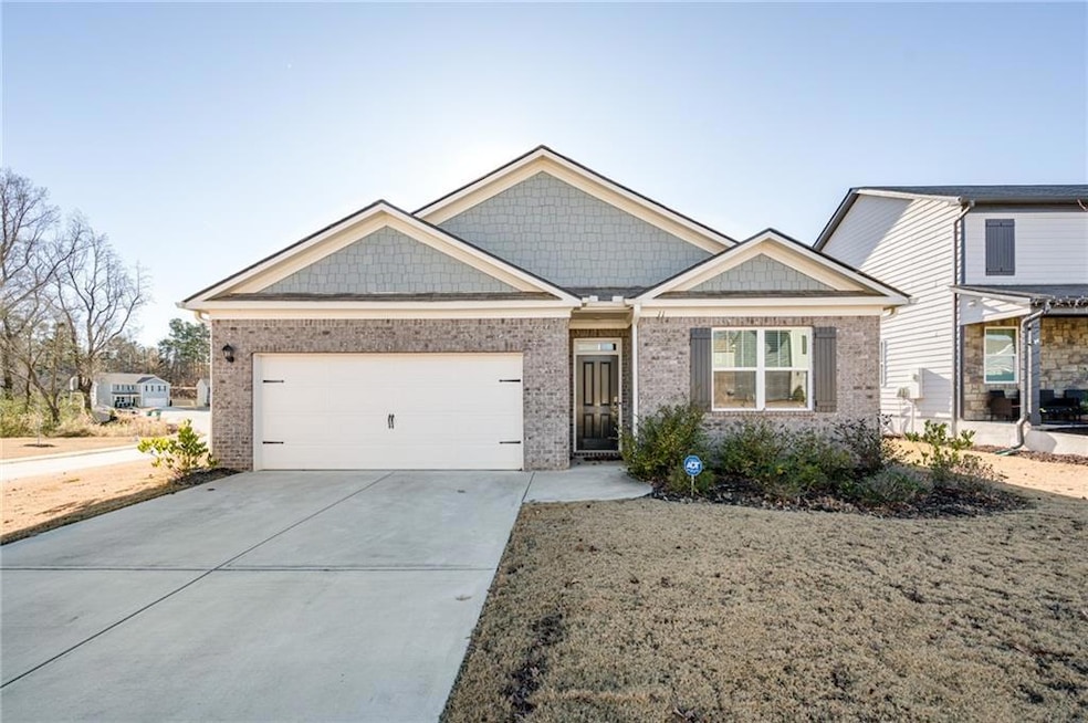 View of front of property with a garage