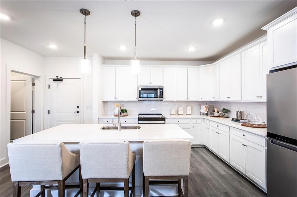 Kitchen featuring stainless steel appliances, deco