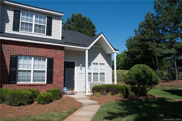 End unit w/ covered front porch to sit & enjoy the
