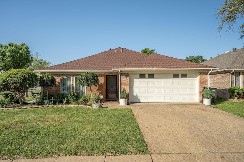 Single story home with a front yard, a shingled ro