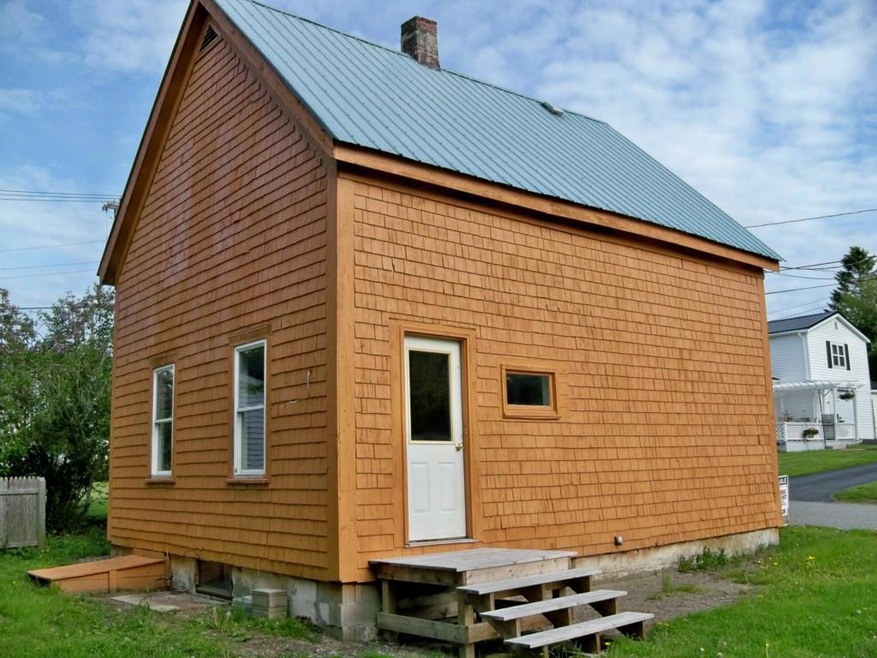 side and back view of house