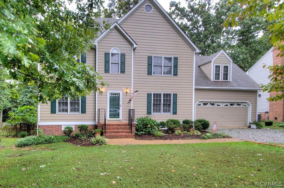 Lovely Transitional with 4BR, 2.5 BA, Brick stoop and 2 car garage