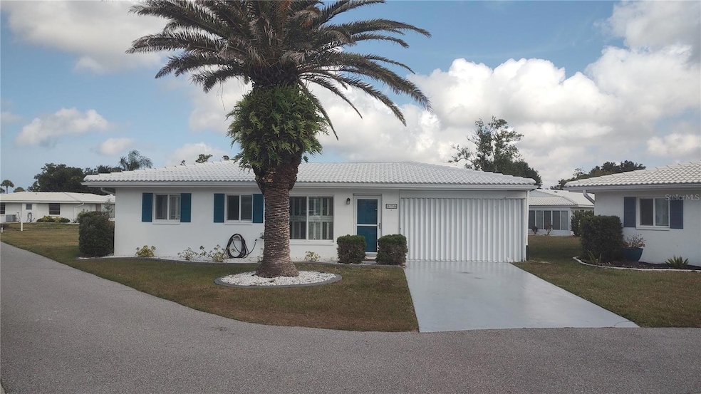 Corner Lot with covered carport. Plantations style shutters throughout.