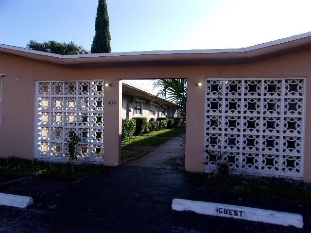 COURTYARD ENTRANCE TO SMALL 10 UNIT COMPLEX.