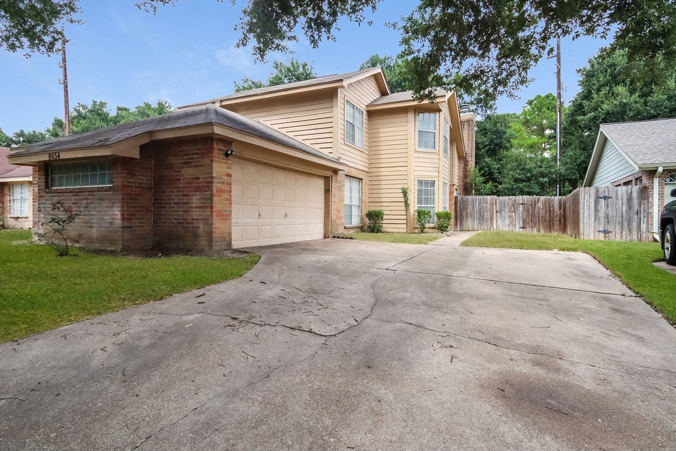 8654 Pine Falls Dr, Houston, TX 77095 - photo 1