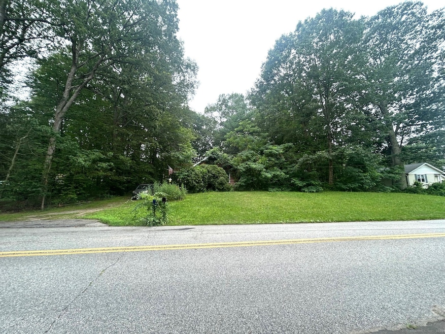Level lot with 125 ft road frontage.