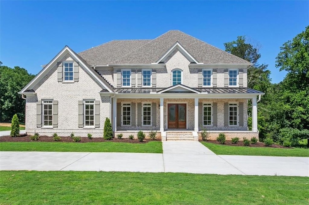 View of front of property with covered porch and a