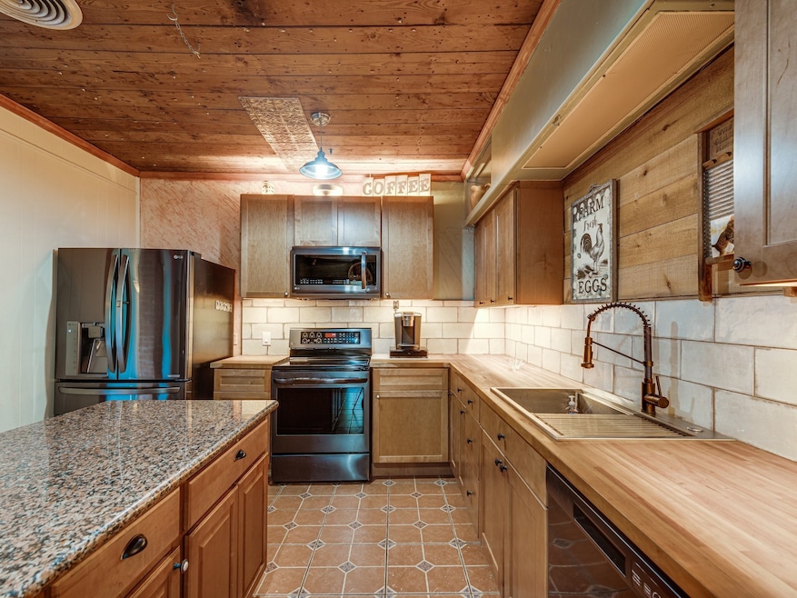 309 E Brown St, Ennis, TX 75119 - photo 1