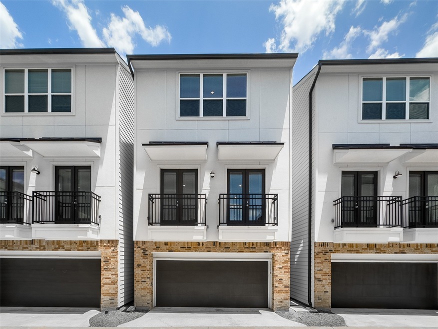 Front entrance with two juliet balconies off of 2n