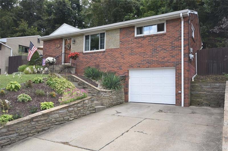 All brick 3 Ranch with extra parking