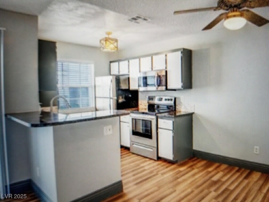 3150 Soft Breezes Dr unit 1033, Las Vegas, NV 89128 - photo 1