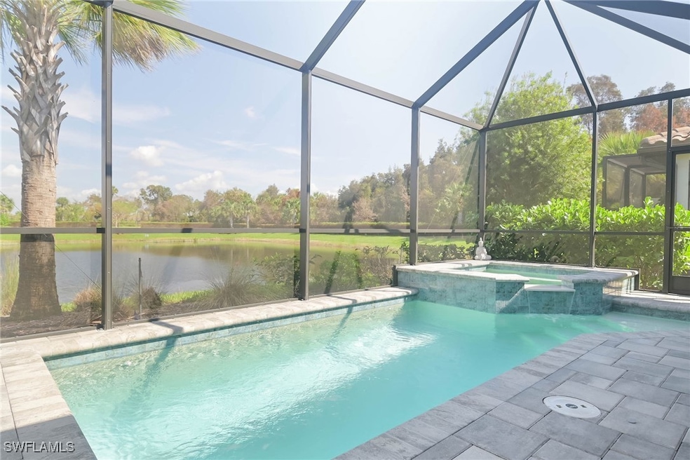 Heated salt water swimming pool and attached spa,