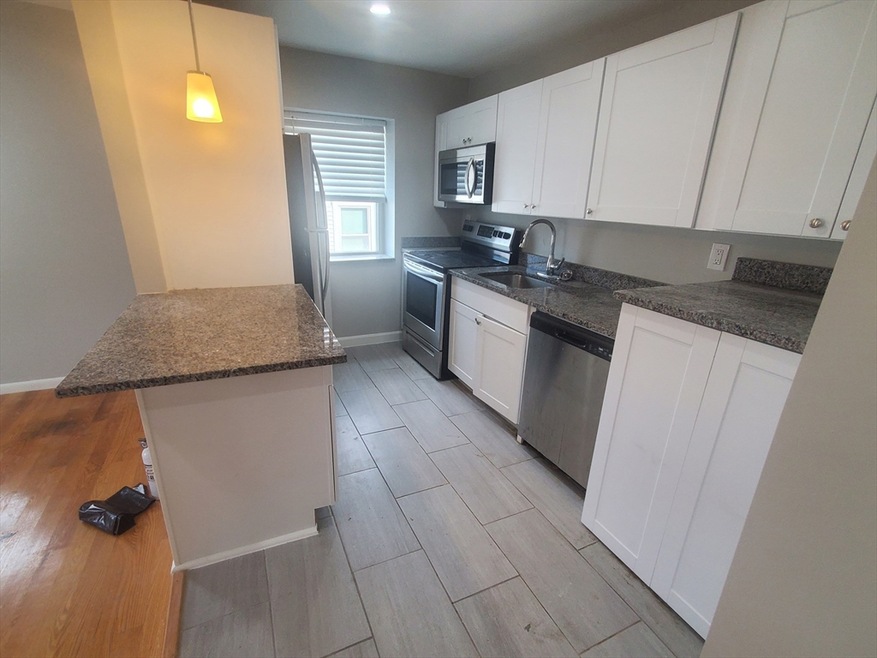 24 Colgate Rd unit 13, Boston, MA 02131 - photo 1