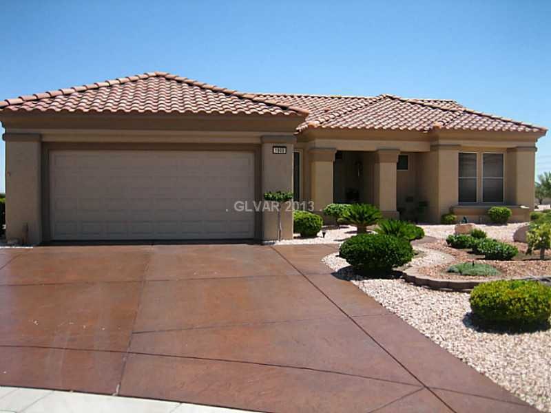 Facade/Exterior Front. Stamped Concrete Driveway