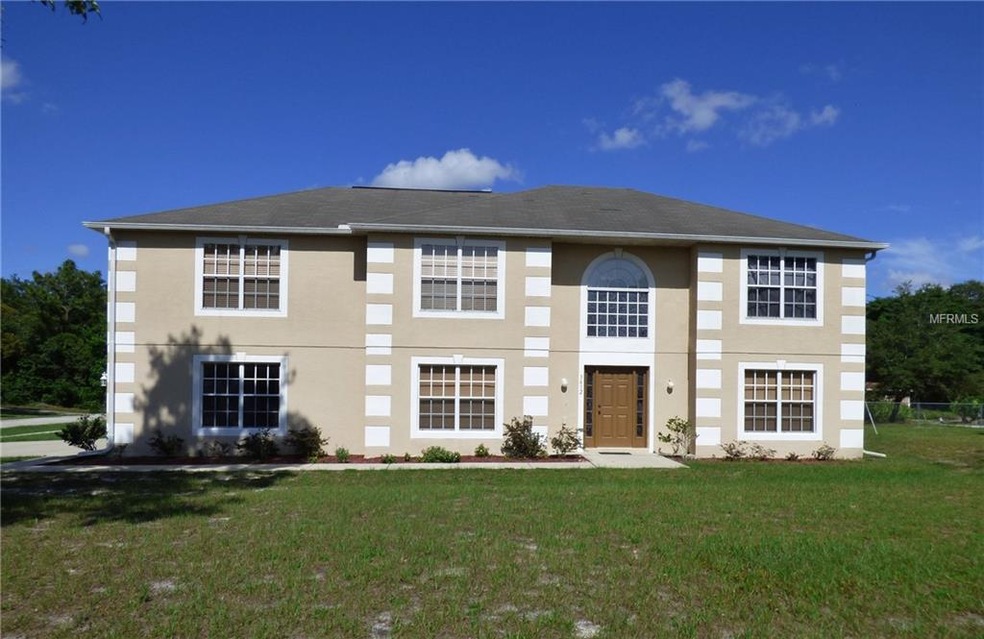 Front elevation - corner lot - side entry 3-car ga
