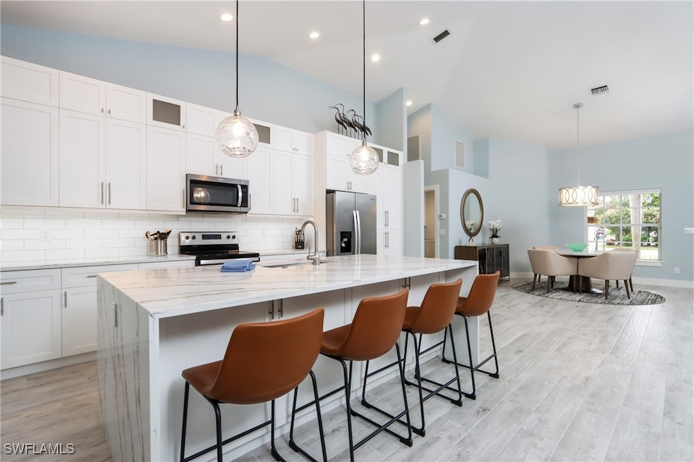 1511 Whispering Oaks Cir, Naples, FL 34110 - photo 1