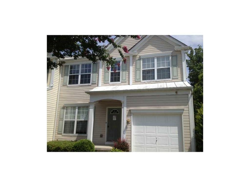 Exterior Front. Attractive end unit.
