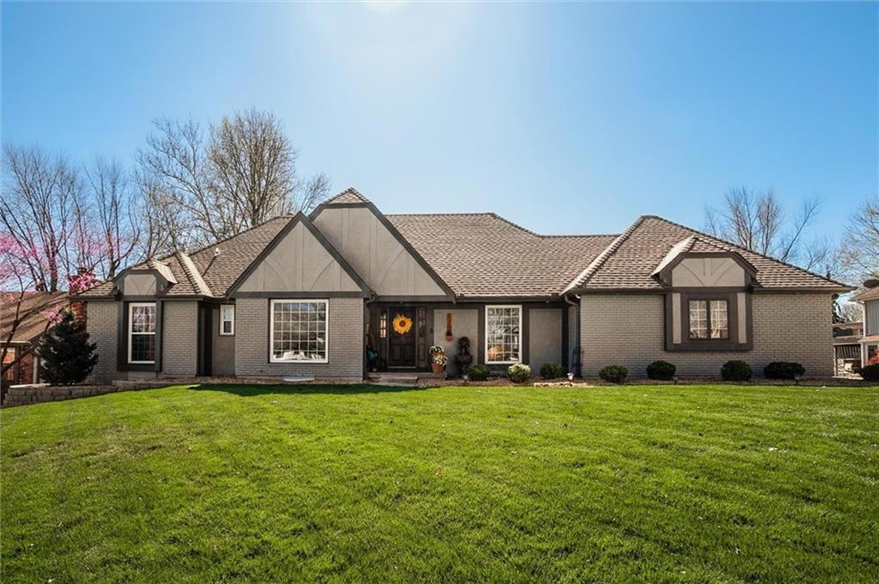 View of front of house with a front lawn
