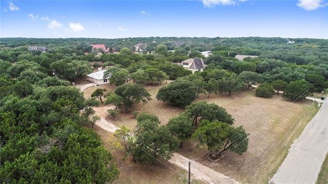 Welcome to 7 Longwood in Heritage Oaks!  2.09 acres, established neighborhood with beautiful trees!  Across 290 from Belterra Village and shopping, movies, restaurants.