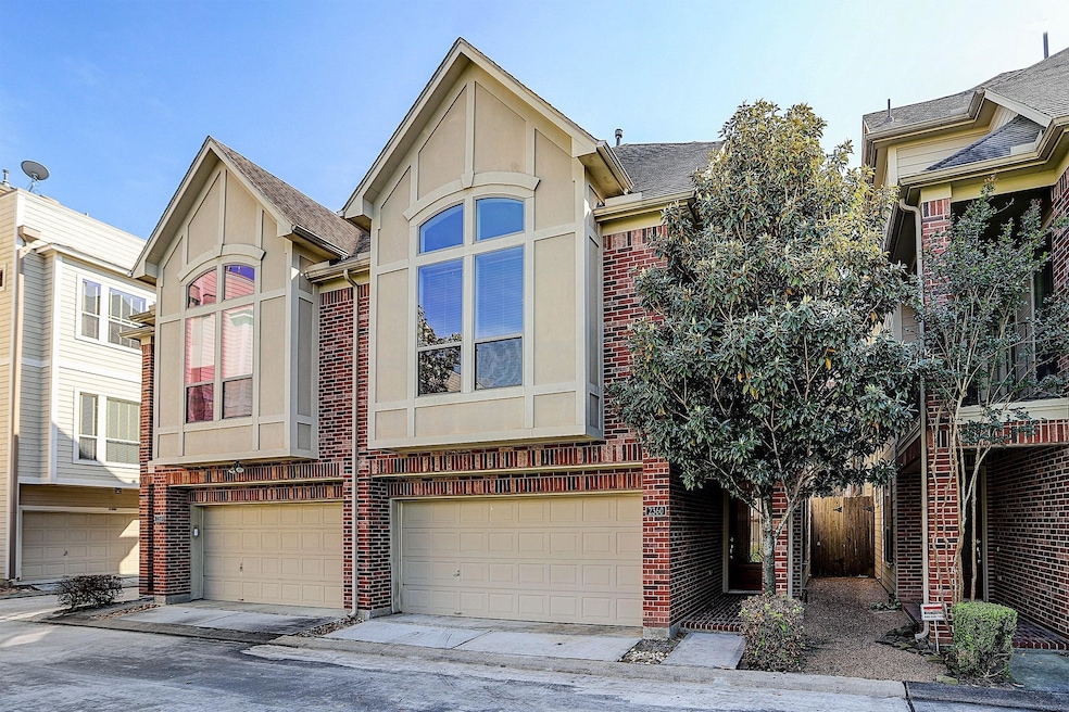 Beautifully maintained 3 story townhome with a pri