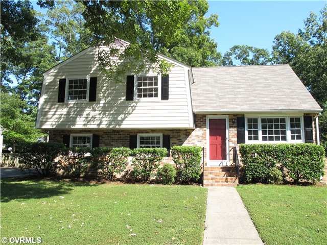 Exterior Front - Low maintenance brick and vinyl e