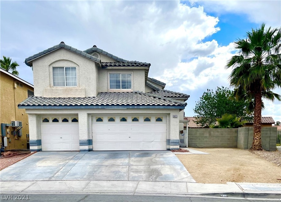 Front Exterior with RV Parking and 3-car garage!