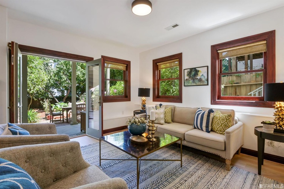 This graceful, two-level condo, ideally located in