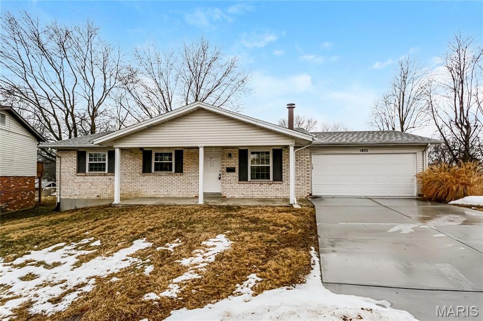 Ranch-style house featuring a porch, an attached garage, concrete driveway, brick siding, and roof with shingles