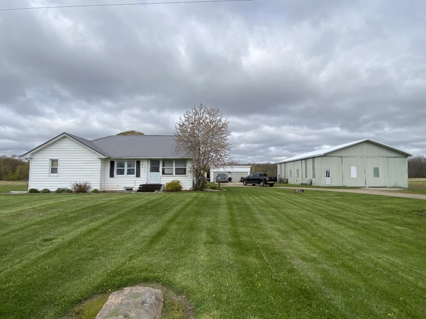 11924 S Waldron Rd, Hubbardston, MI 48845 - photo 1